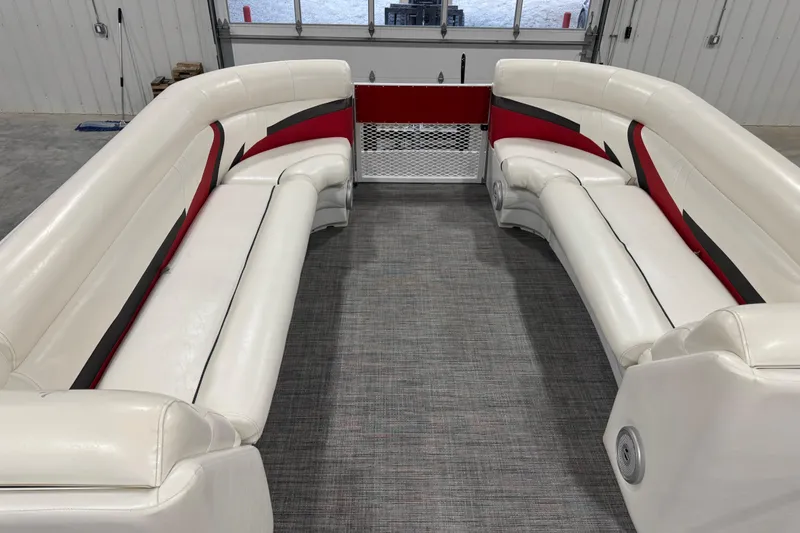 Slide: The Image of Interior of 2015 JC 241 Spirit TT Sport boat with white and red seating. - 11