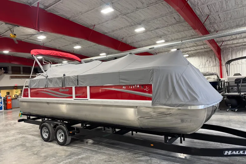 Slide: The Image of 2015 JC 241 Spirit TT Sport pontoon boat with cover in a showroom. - 12