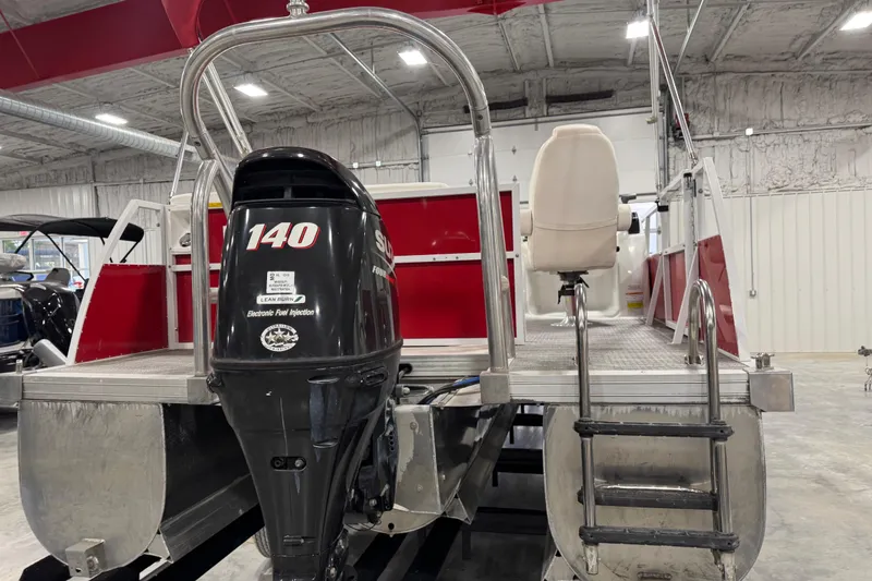 Slide: The Image of 2015 JC 241 Spirit TT Sport boat with Suzuki 140 outboard motor in a showroom. - 5