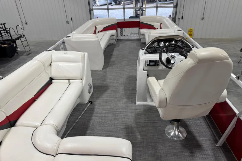 Slide: The Image of Luxurious interior of 2015 JC 241 Spirit TT Sport pontoon boat with plush seating and modern helm. - 6