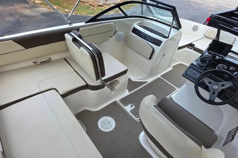 Slide: The Image of 2019 Bayliner VR4 Bowrider I/O interior with modern seating and dashboard design. - 11