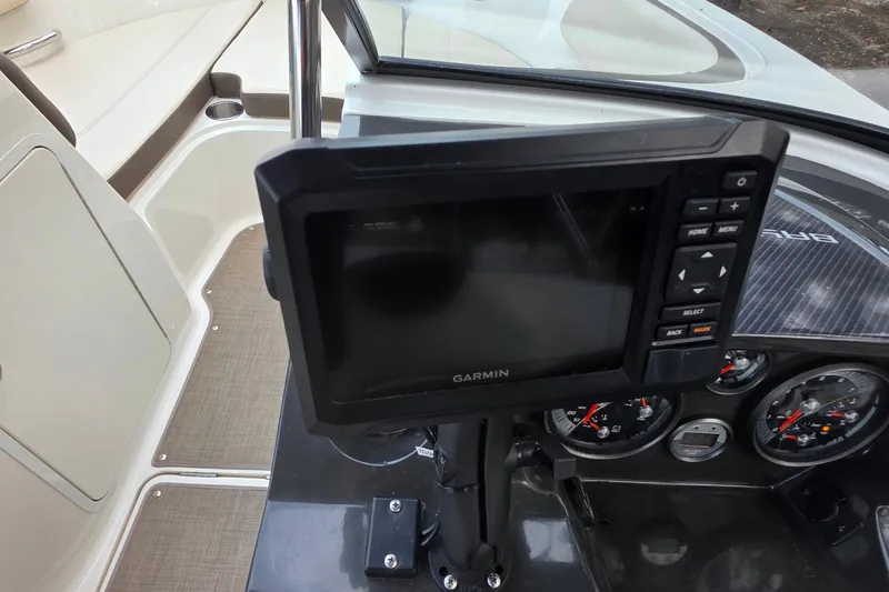 Slide: The Image of 2019 Bayliner VR4 Bowrider I/O dashboard with Garmin navigation system and gauges. - 15