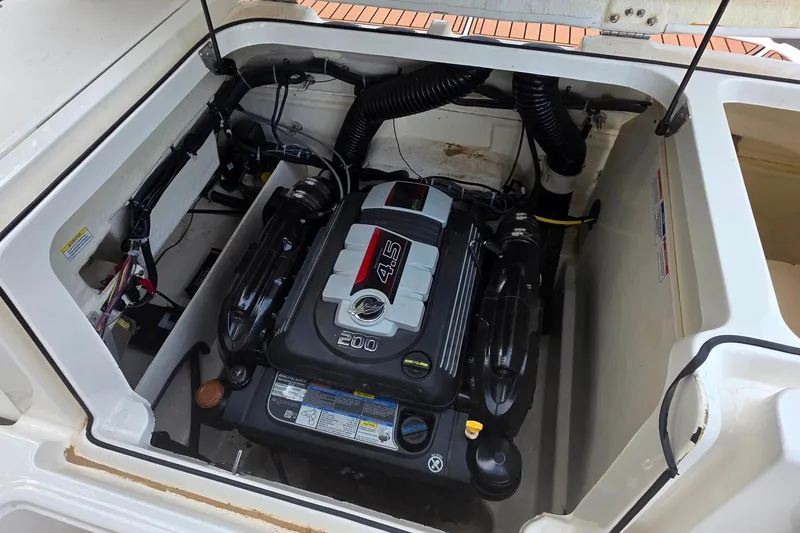 Slide: The Image of 2019 Bayliner VR4 Bowrider I/O engine compartment with 4.5L 200 HP engine. - 17