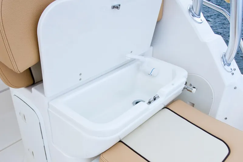 Slide: The Image of Manufacturer Provided Image: 2015 Wellcraft 290 Coastal boat sink and seating area. - 24