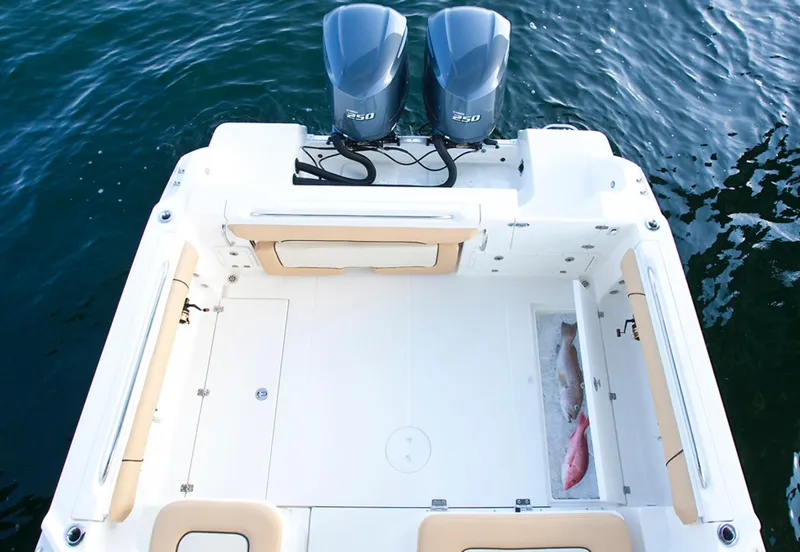 Slide: The Image of Manufacturer Provided Image: 2015 Wellcraft 290 Coastal boat with twin outboard engines and spacious deck. - 25