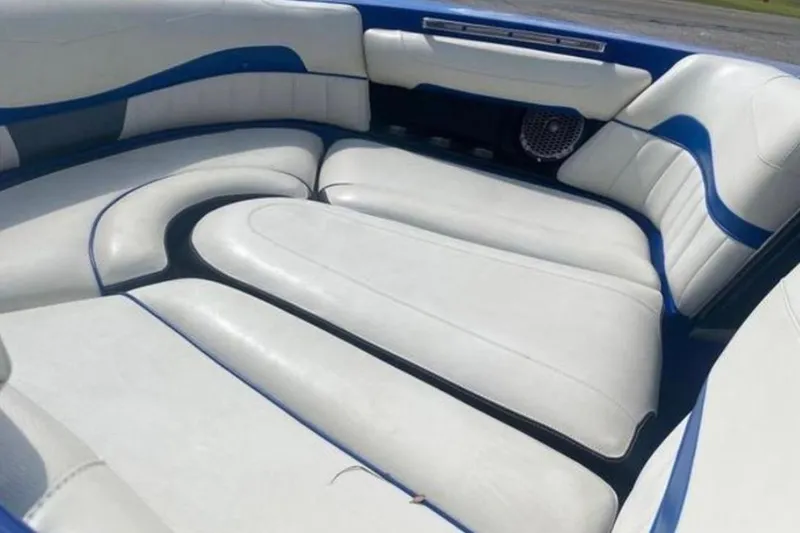 Slide: The Image of Luxurious white seating in 2012 Malibu Wakesetter 22 MXZ boat interior. - 11