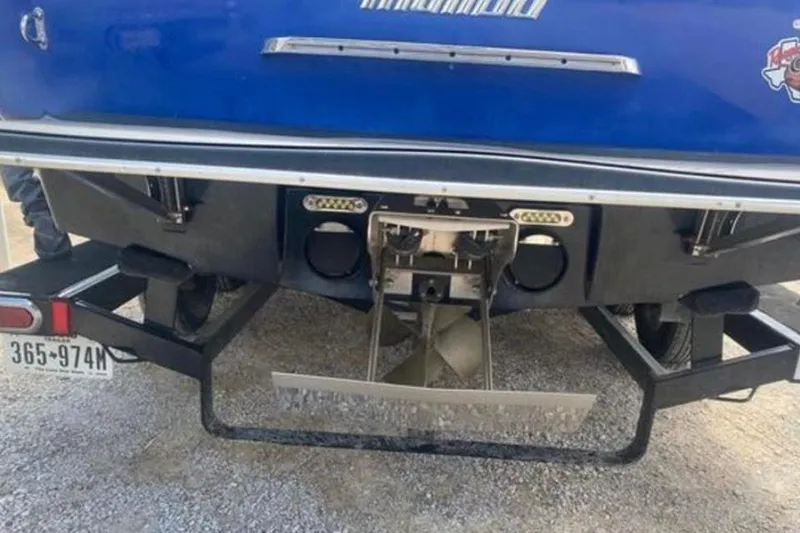 Slide: The Image of Rear view of a 2012 Malibu Wakesetter 22 MXZ boat on a trailer. - 8