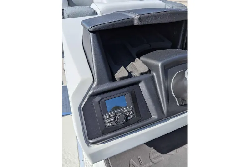 Slide: The Image of 2026 Alera M23Q dashboard with control panel and storage compartment. - 10