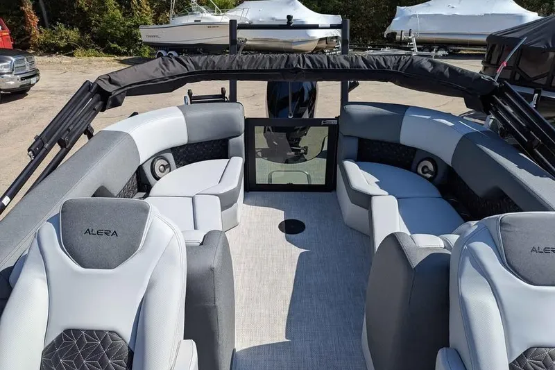Slide: The Image of 2026 Alera M23Q boat interior with modern seating and sleek design. - 7