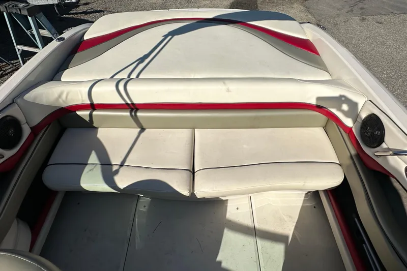 Slide: The Image of 2005 Sea Ray 220 Select boat interior with white and red seating. - 15