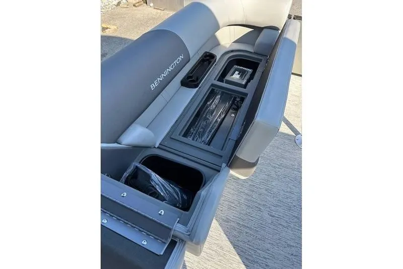 Slide: The Image of 2026 Bennington 23 SSR Quad Bench with storage compartments and cup holders. - 10