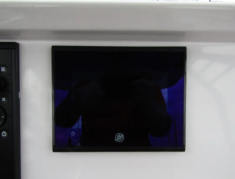 Slide: The Image of Dashboard screen on 2022 Axopar 22 T-Top boat. - 14