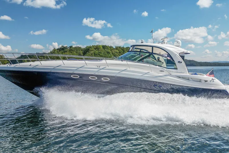 Slide: The Image of 2005 Sea Ray 500 Sundancer yacht cruising on a sunny day with clear skies. - 19