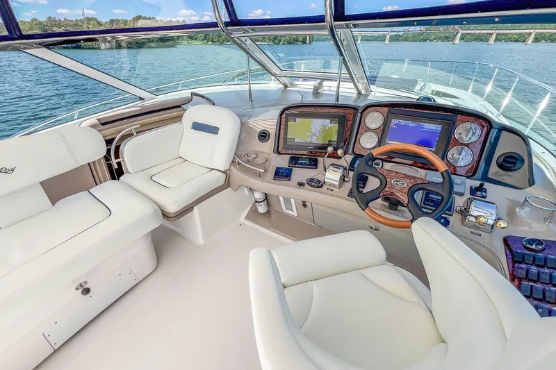 Slide: The Image of Luxurious helm of 2005 Sea Ray 500 Sundancer yacht with modern navigation systems. - 28