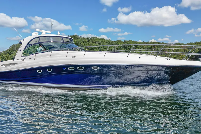 Slide: The Image of 2005 Sea Ray 500 Sundancer yacht cruising on a sunny day with blue skies. - 3