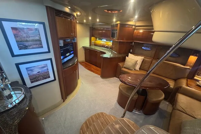 Slide: The Image of Luxurious interior of 2005 Sea Ray 500 Sundancer yacht with elegant wood finishes. - 36