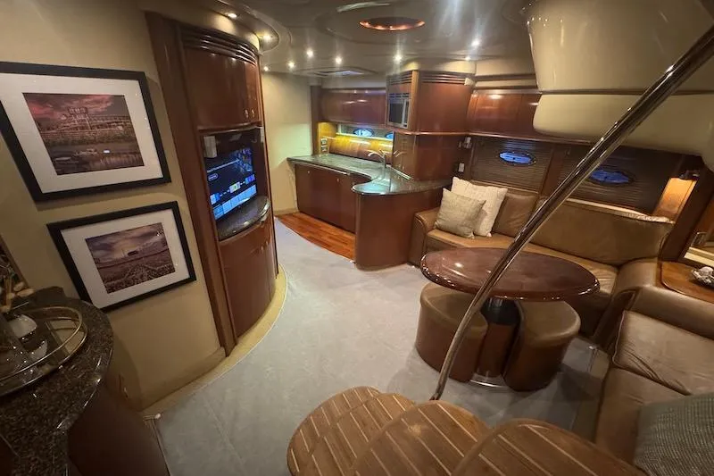 Slide: The Image of Luxurious interior of 2005 Sea Ray 500 Sundancer yacht with elegant wood finishes. - 37