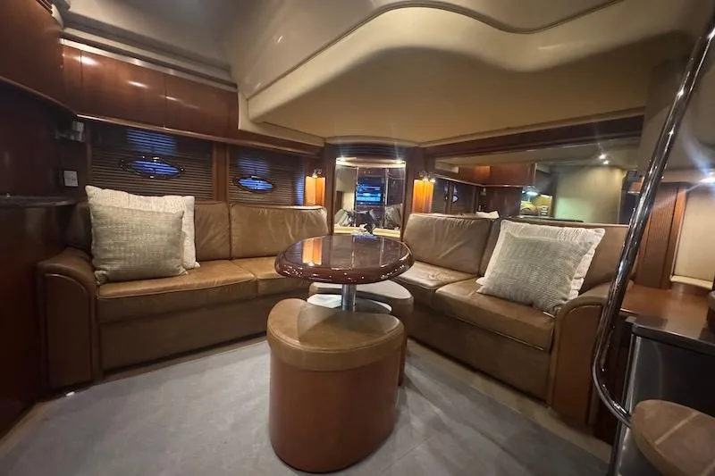 Slide: The Image of Luxurious interior of 2005 Sea Ray 500 Sundancer yacht with leather seating and elegant lighting. - 39