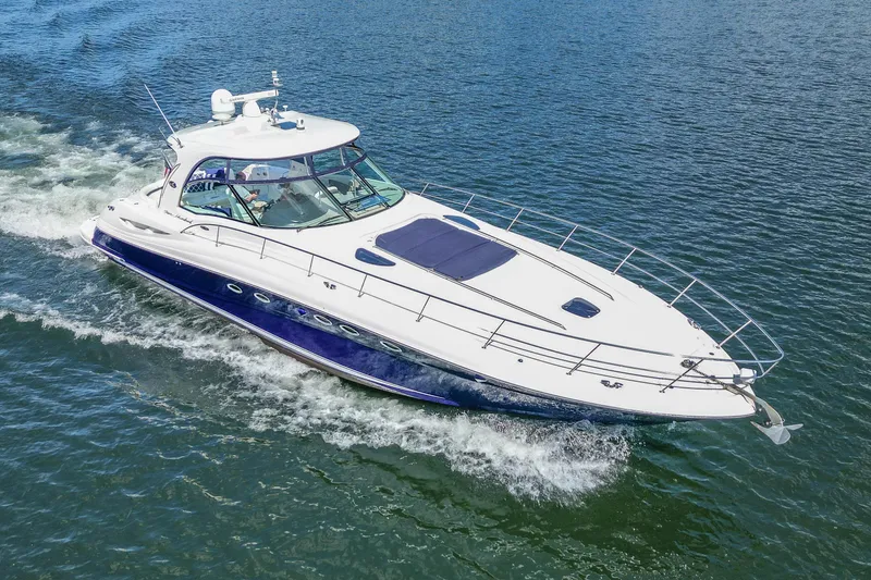 Slide: The Image of 2005 Sea Ray 500 Sundancer yacht cruising on open water. - 4
