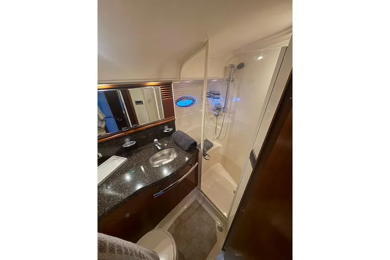 Slide: The Image of Luxurious bathroom in 2005 Sea Ray 500 Sundancer yacht with modern amenities. - 53