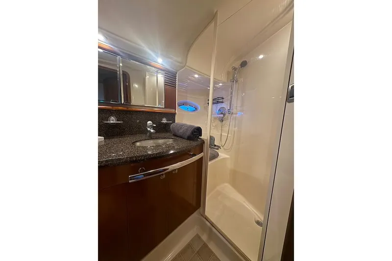 Slide: The Image of Luxurious bathroom in 2005 Sea Ray 500 Sundancer yacht with modern fixtures and shower. - 54