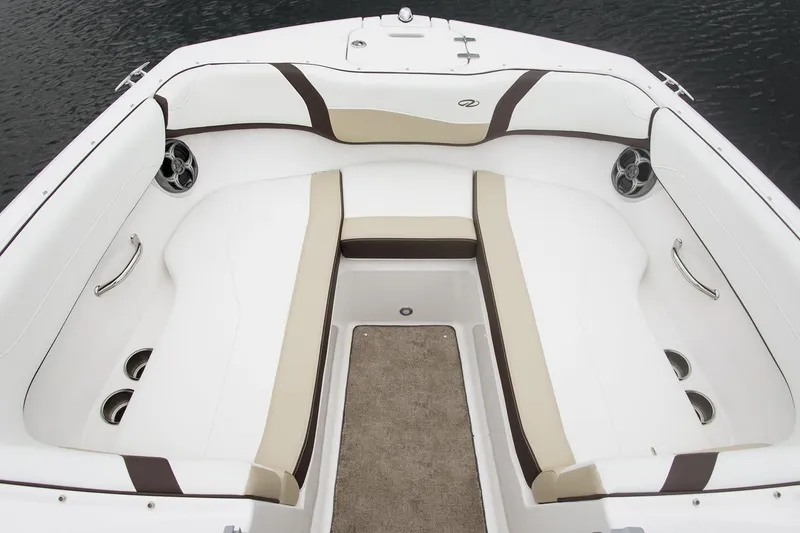 Slide: The Image of 2019 Regal 23 OBX boat interior with white and beige seating. - 42