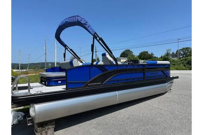 The Image of 2026 Bennington 23 SSB Swing Back Pontoon, blue and silver, parked outdoors. - 1