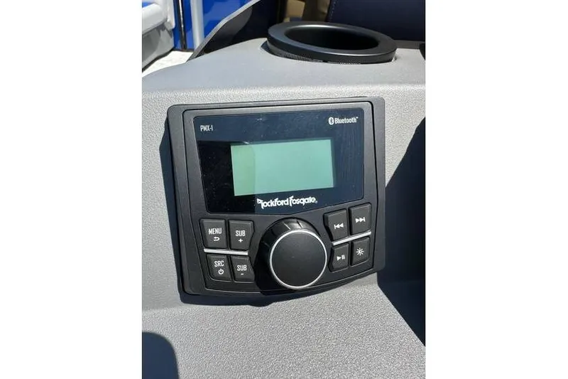 Slide: The Image of Control panel of 2026 Bennington 23 SSB Swing Back Pontoon with Rockford Fosgate audio system. - 16