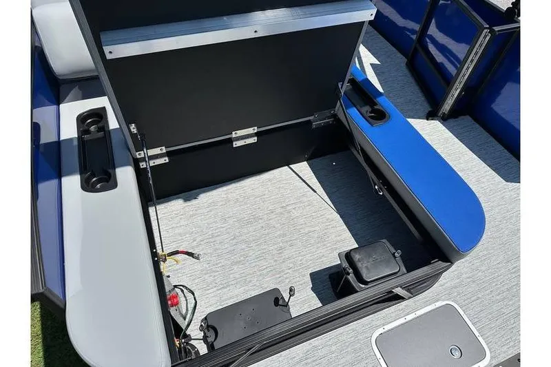 Slide: The Image of 2026 Bennington 23 SSB Swing Back Pontoon interior with storage compartment open. - 19