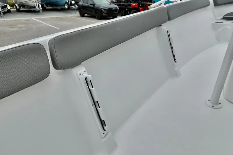 Slide: The Image of Interior view of ALK2 23 CRX boat, featuring cushioned seating and sleek design, 2026 model. - 11