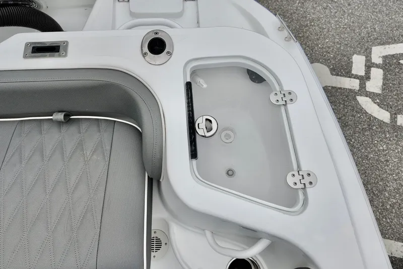 Slide: The Image of Interior view of ALK2 23 CRX 2026 boat with storage compartment and seating. - 14