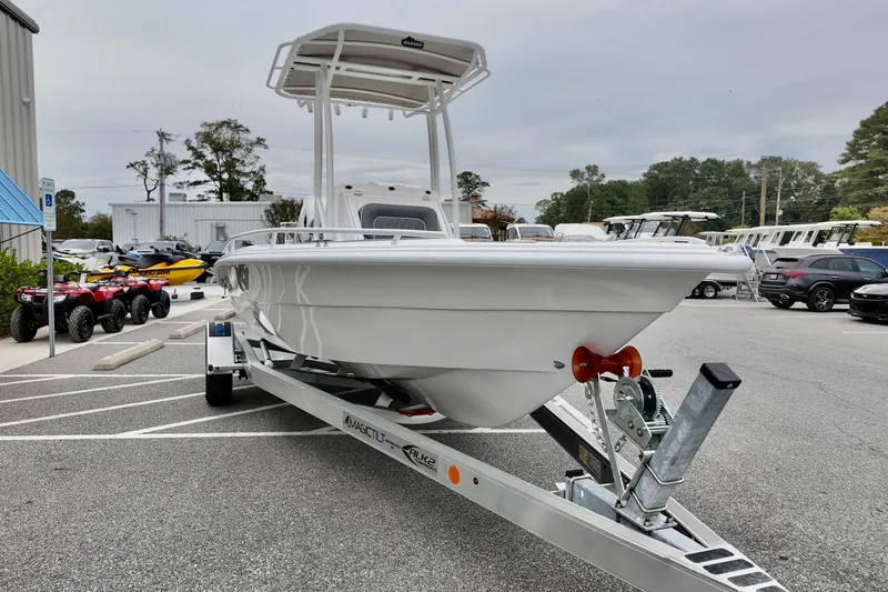 Slide: The Image of 2026 ALK2 23 CRX boat on trailer in outdoor dealership lot. - 4