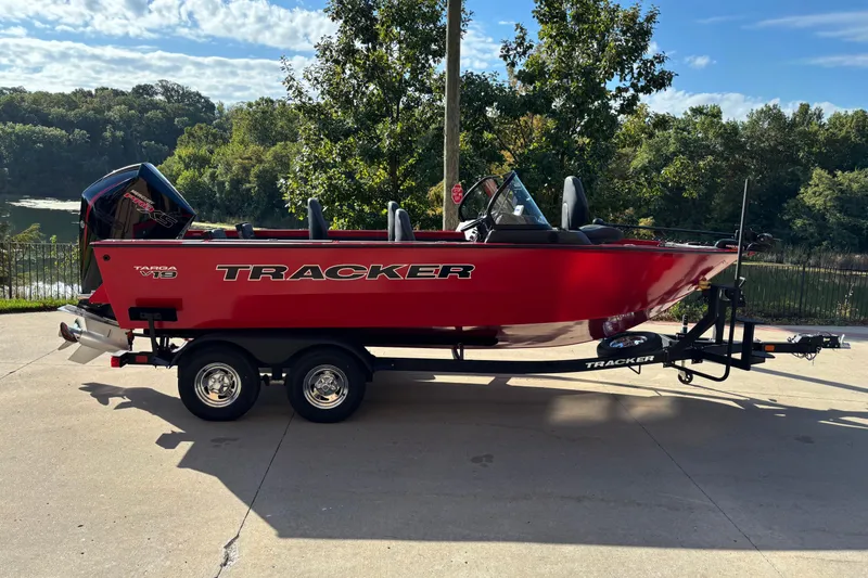 The Image of 2026 Tracker Targa V-19 Combo boat on trailer, parked outdoors. - 0
