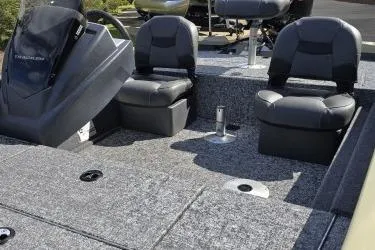 Slide: The Image of 2026 Tracker Pro Team 175 Crappie Edition boat interior with seating and console. - 4