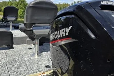 Slide: The Image of 2026 Tracker Pro Team 175 Crappie Edition boat with Mercury engine, featuring comfortable seating. - 6