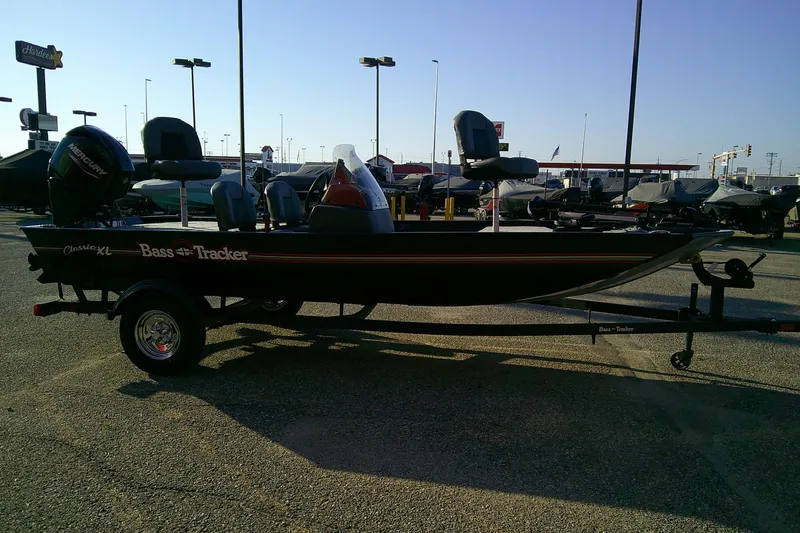 Slide: The Image of 2026 Tracker Bass Tracker Classic XL boat on trailer in parking lot. - 5