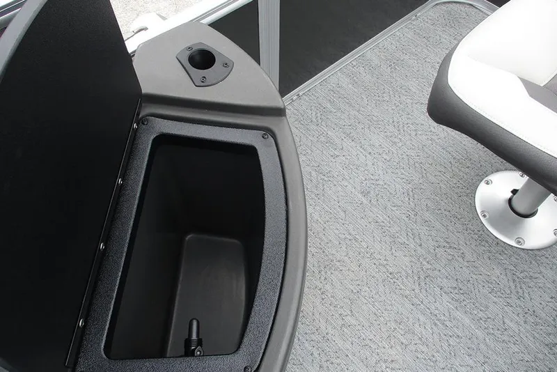 Slide: The Image of 2026 Sun Tracker Bass Buggy 18 DLX storage compartment and seating detail. - 26