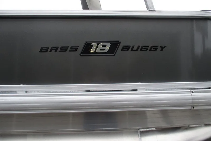 Slide: The Image of 2026 Sun Tracker Bass Buggy 18 DLX logo on boat exterior. - 31