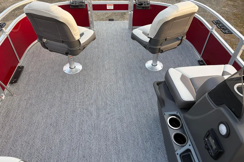 Slide: The Image of 2026 Sun Tracker Bass Buggy 16 XL Select interior with seating and console. - 73