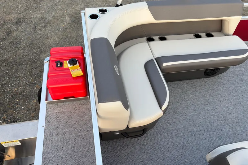 Slide: The Image of 2026 Sun Tracker Bass Buggy 16 XL Select pontoon with seating and red fuel tank. - 75