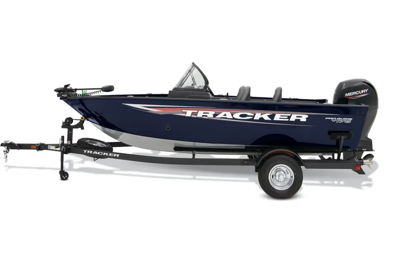 Slide: The Image of 2026 Tracker Pro Guide V-175 Combo boat with Mercury outboard engine in parking lot. - 10