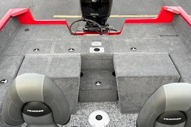 Slide: The Image of 2026 Tracker Pro Guide V-175 Combo boat interior with seating and storage compartments. - 93