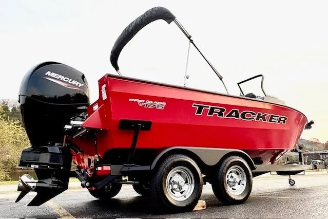Slide: The Image of 2026 Tracker Pro Guide V-175 Combo boat with Mercury engine on trailer. - 95