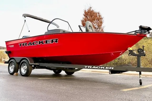 Slide: The Image of 2026 Tracker Pro Guide V-175 Combo boat in vibrant red on a trailer. - 96