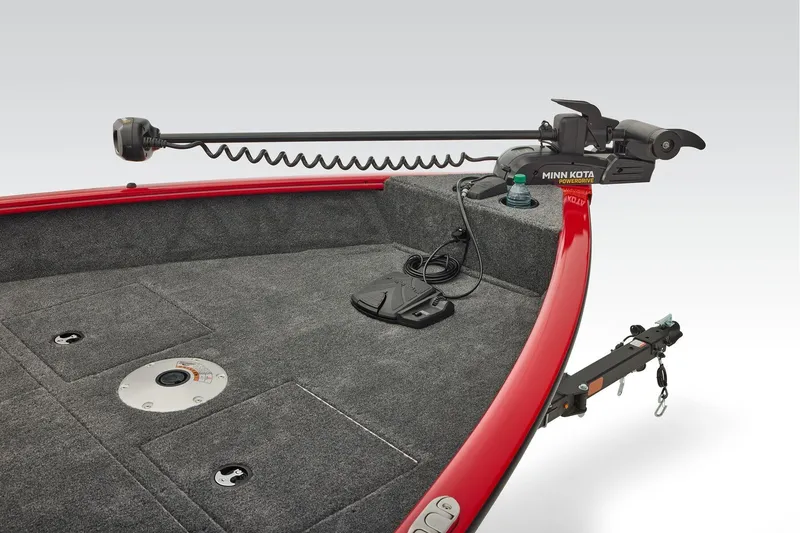 Slide: The Image of 2026 Tracker Pro Guide V-16 SC boat interior with steering wheel and dashboard controls. - 11