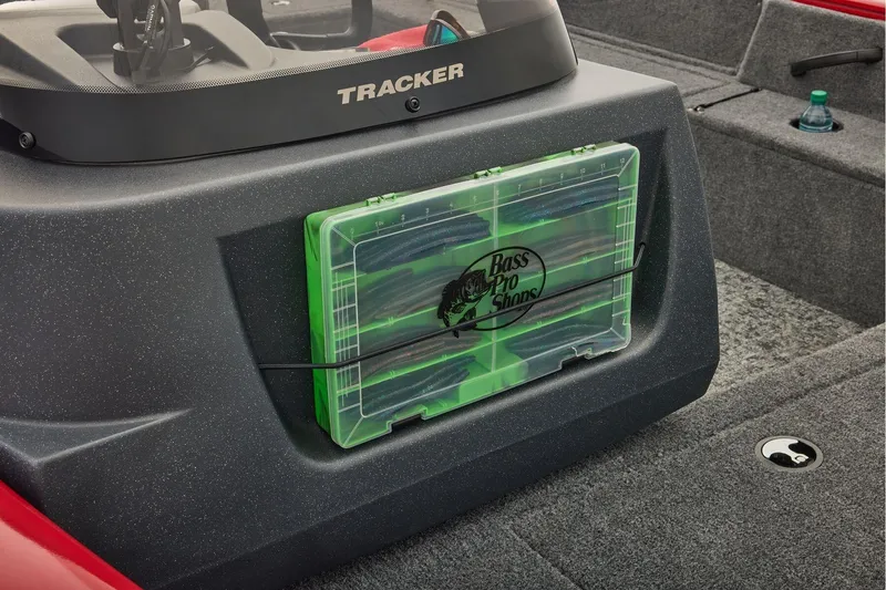 Slide: The Image of 2026 Tracker Pro Guide V-16 SC boat interior with gray seats and carpeted floor. - 16