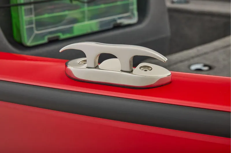 Slide: The Image of 2026 Tracker Pro Guide V-16 SC boat dashboard with steering wheel and gauges. - 17