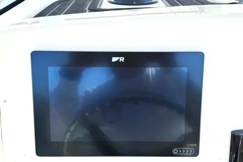 Slide: The Image of Touchscreen display on 2022 Boston Whaler 220 Dauntless boat dashboard. - 13