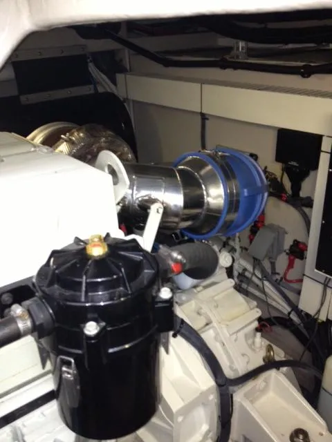 Slide: The Image of Engine room of 2004 Sea Ray 500 Sundancer yacht, showcasing mechanical components. - 12