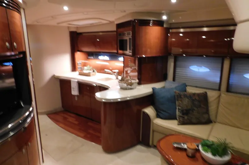 Slide: The Image of Luxurious interior of 2004 Sea Ray 500 Sundancer yacht with elegant wood finishes. - 17